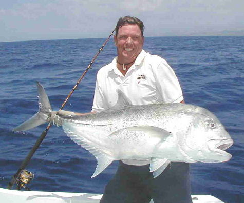Capt. Jeff Rogers with a 75 lb. Giant Trevally caught on a jig.....This is one of the hardest fighting fish you can catch!